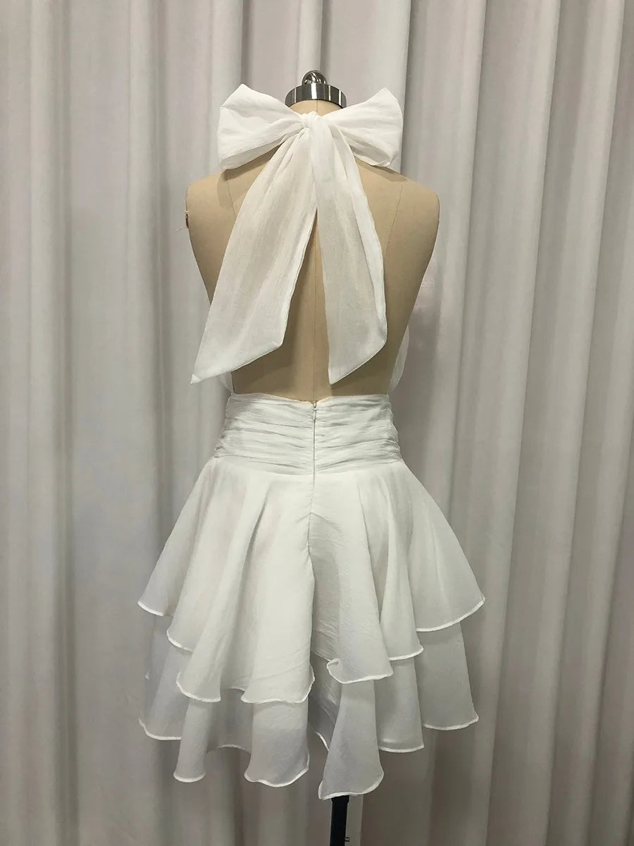 The Capri Backless Ruffle Dress from the Soft & Sophisticated at Lavishly Me