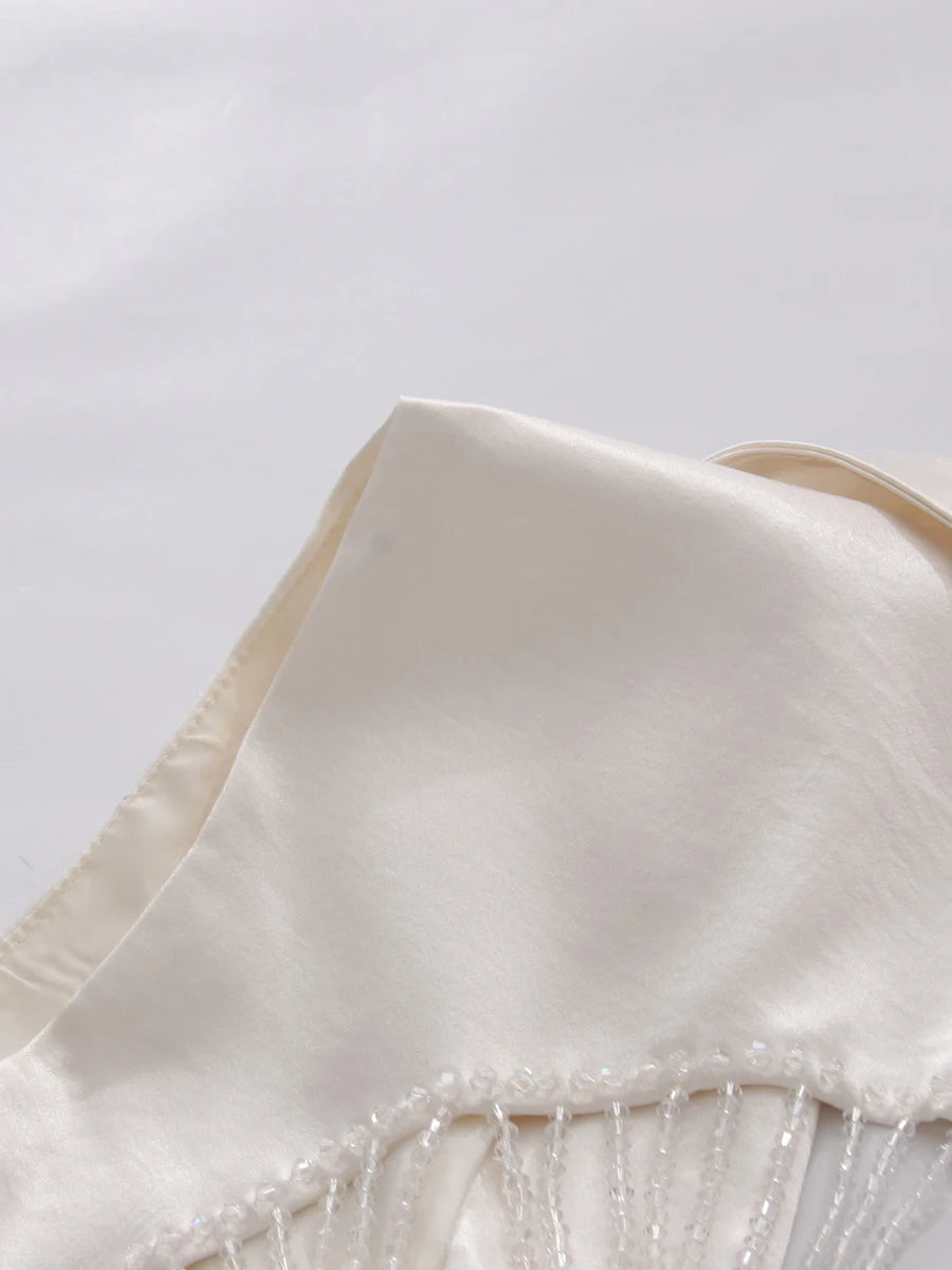 TWOTWINSTYLE Elegant White Cutout Back Sleeveless Blazer for Women Lapel Spliced Pearl Fashion Coat for Formal Office Commute