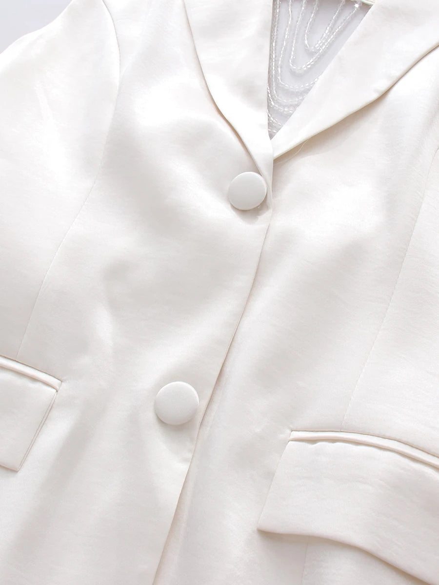 TWOTWINSTYLE Elegant White Cutout Back Sleeveless Blazer for Women Lapel Spliced Pearl Fashion Coat for Formal Office Commute