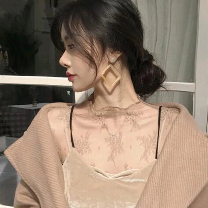 The Noir Veil Mesh Top