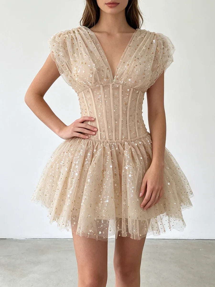 The Lumière Sequin Ruffle Mini Dress from the Celebration Edit at Lavishly Me