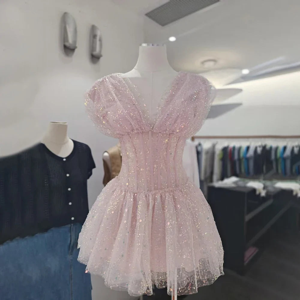 The Lumière Sequin Ruffle Mini Dress from the Celebration Edit at Lavishly Me