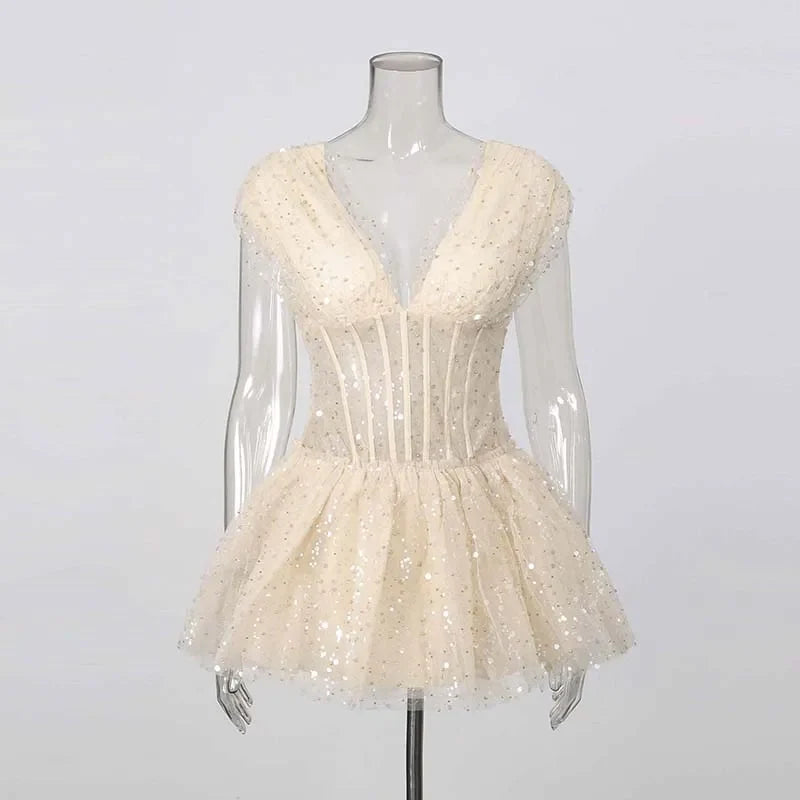 The Lumière Sequin Ruffle Mini Dress from the Celebration Edit at Lavishly Me