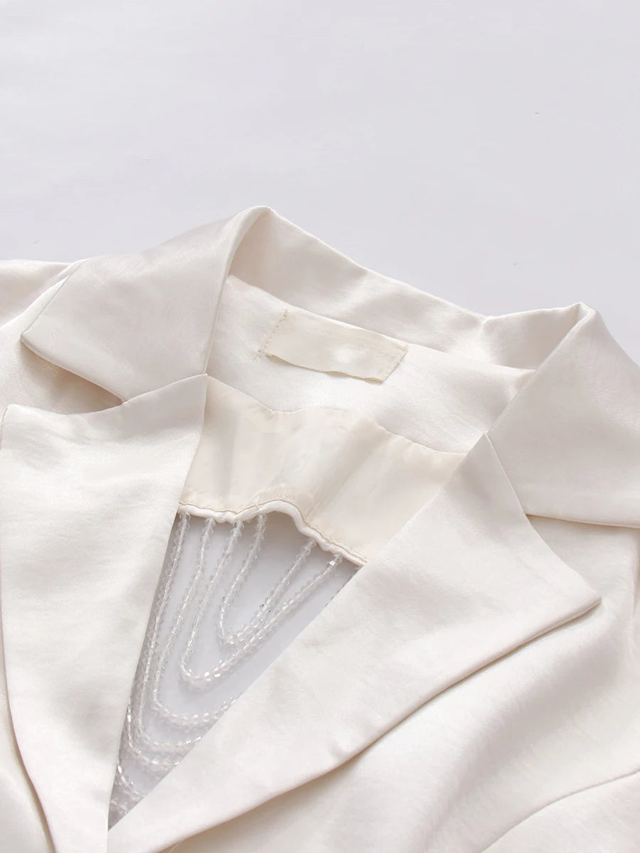 TWOTWINSTYLE Elegant White Cutout Back Sleeveless Blazer for Women Lapel Spliced Pearl Fashion Coat for Formal Office Commute