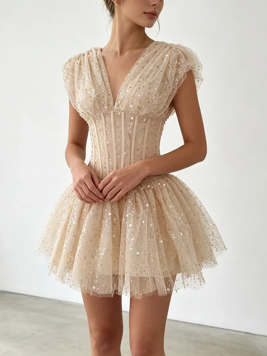 The Lumière Sequin Ruffle Mini Dress from the Celebration Edit at Lavishly Me