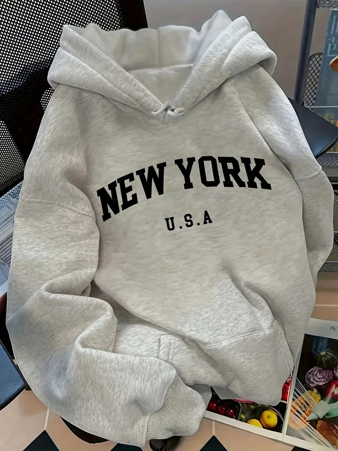 The Manhattan Relaxed Graphic Hoodie from the Resort Luxe at Lavishly Me