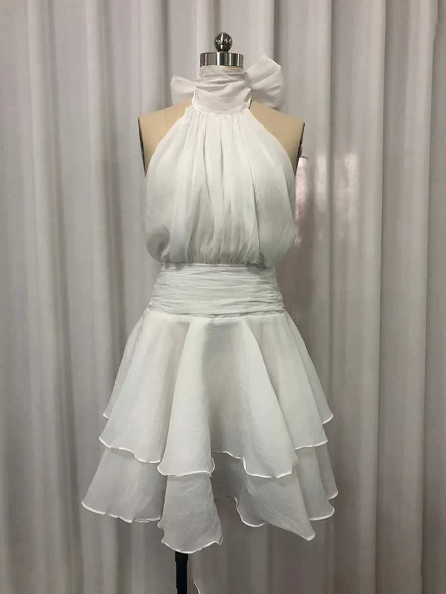 The Capri Backless Ruffle Dress from the Soft & Sophisticated at Lavishly Me