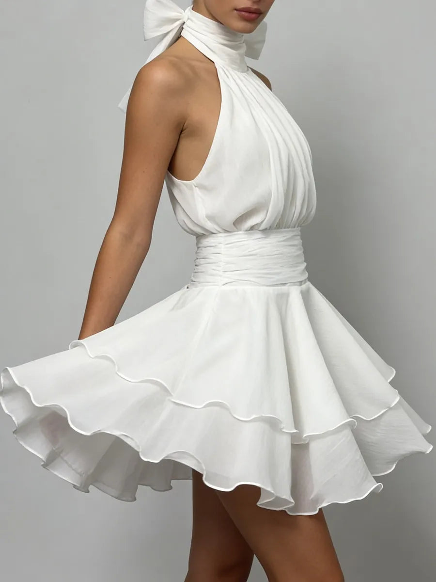 The Capri Backless Ruffle Dress from the Soft & Sophisticated at Lavishly Me